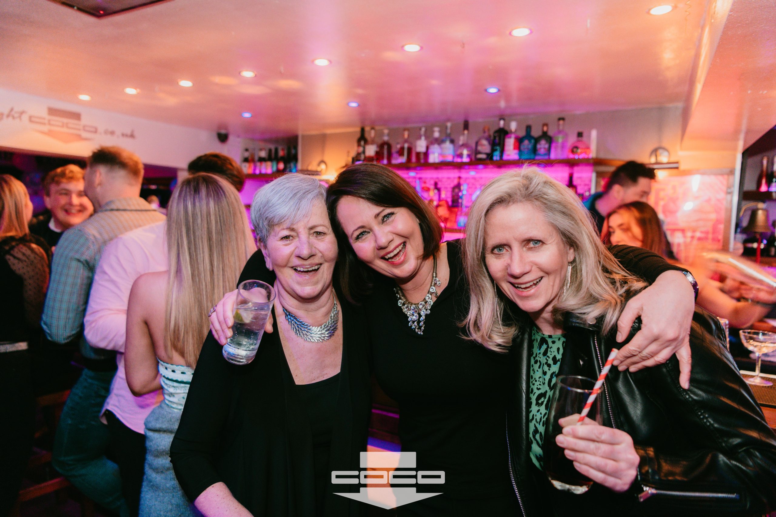 Friends raising a toast at a private party at COCO Cheltenham